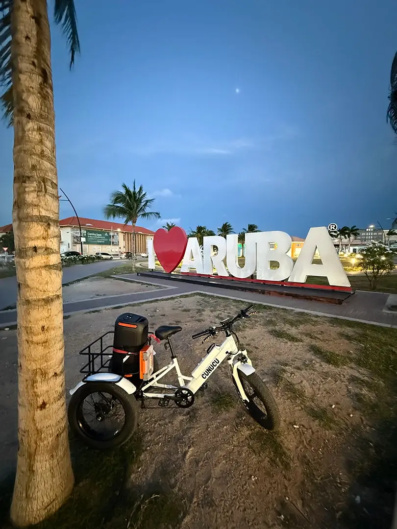 I Love Aruba sign at golden hour